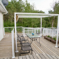 deck space with pergola shade cover